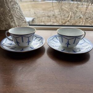 Two sets of vintage royal crown derby “ blue bell on chains”tea cups and saucers